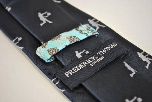 navy tie with tennis player embroidered design